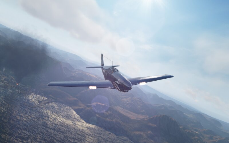 Warplane flying over mountains