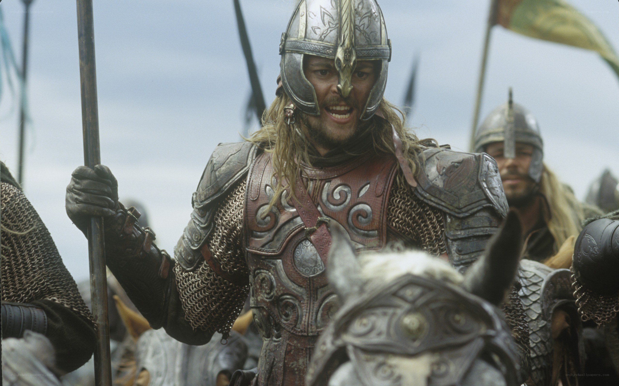 warrior in armor on horseback