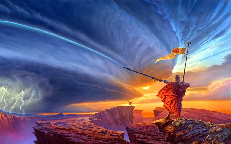 Warrior on a cliff at sunset