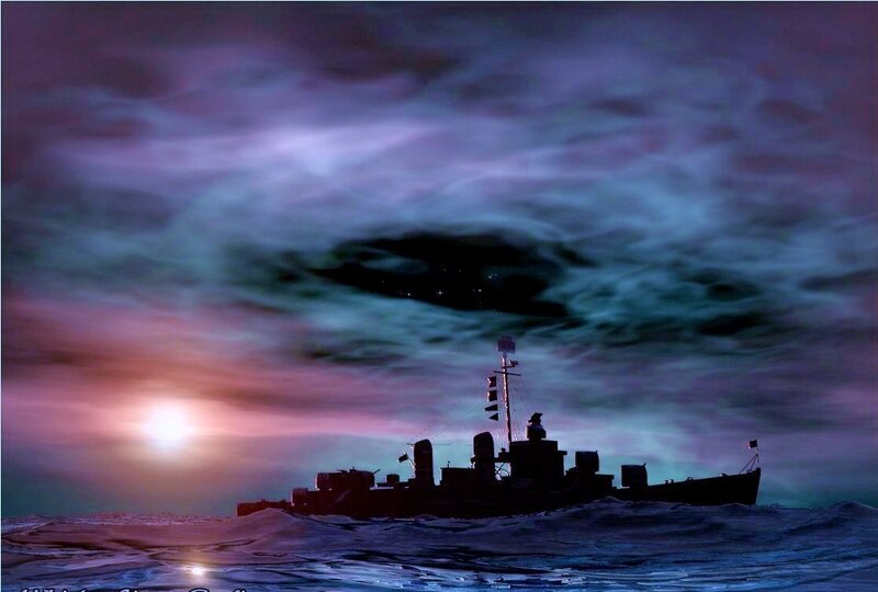 warship at sunset on the ocean