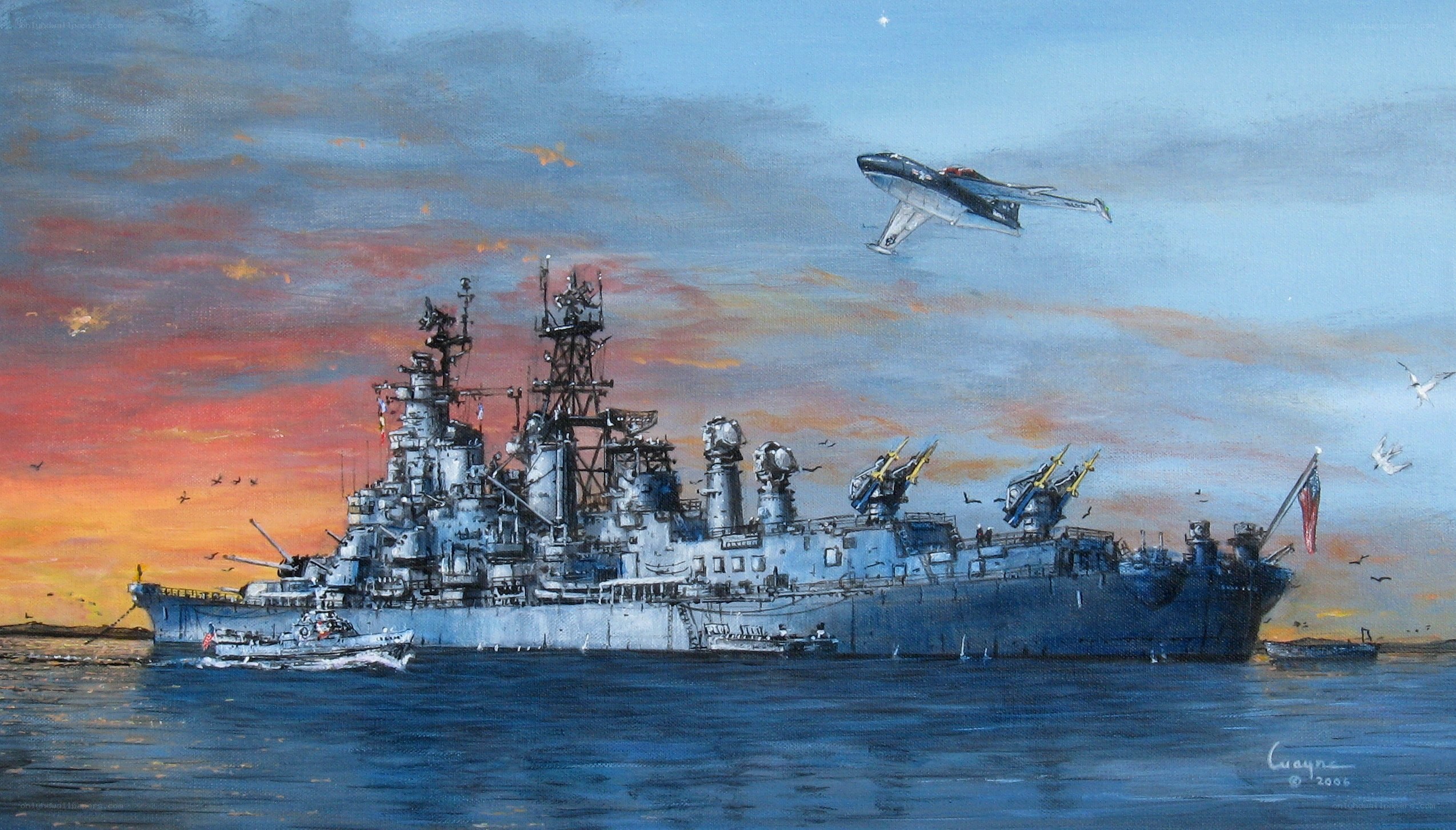 Warship at sunset with aircraft