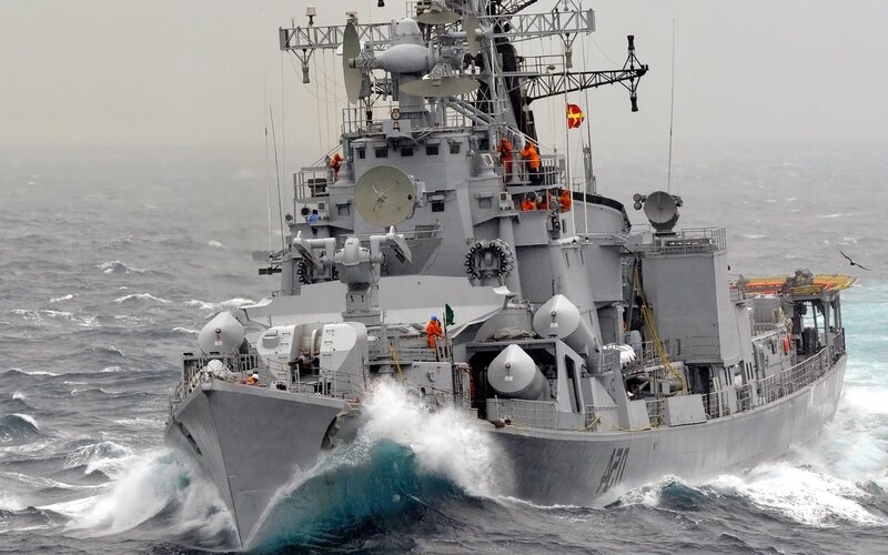 Warship navigating rough seas