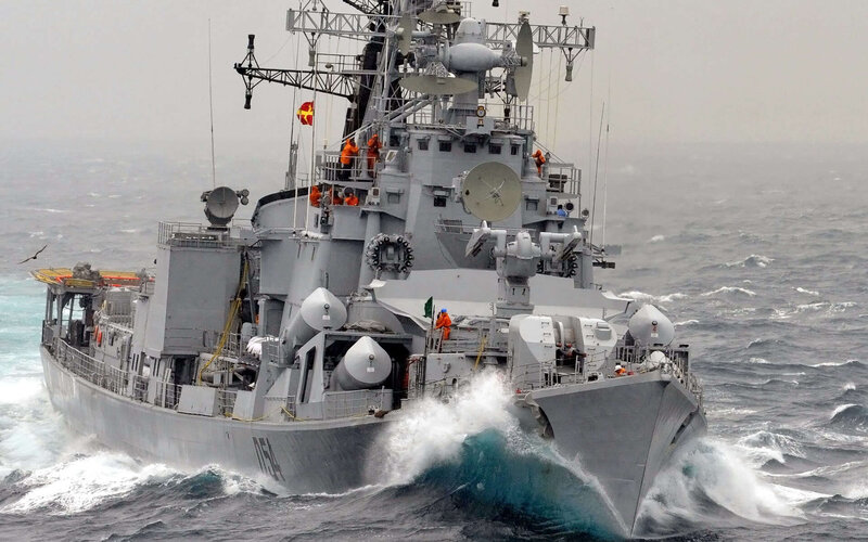 Warship navigating rough seas