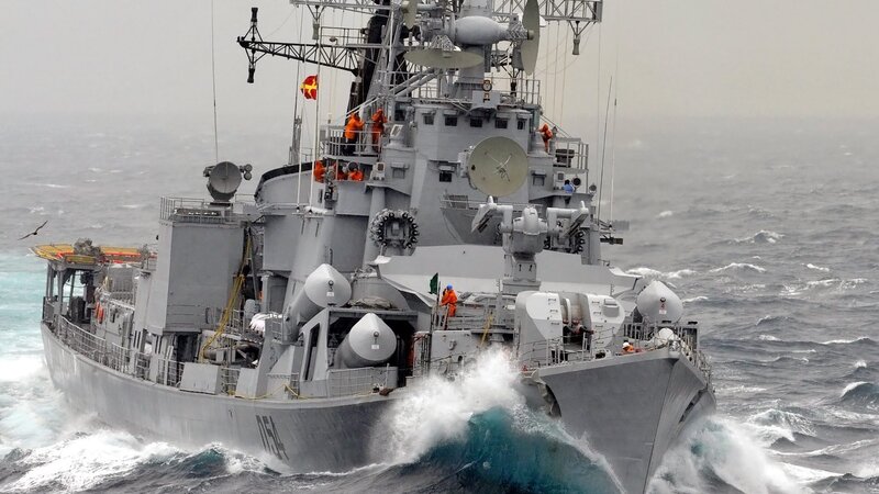 Warship navigating rough seas