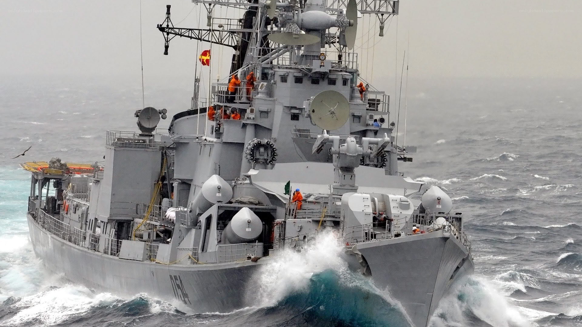 Warship navigating rough seas