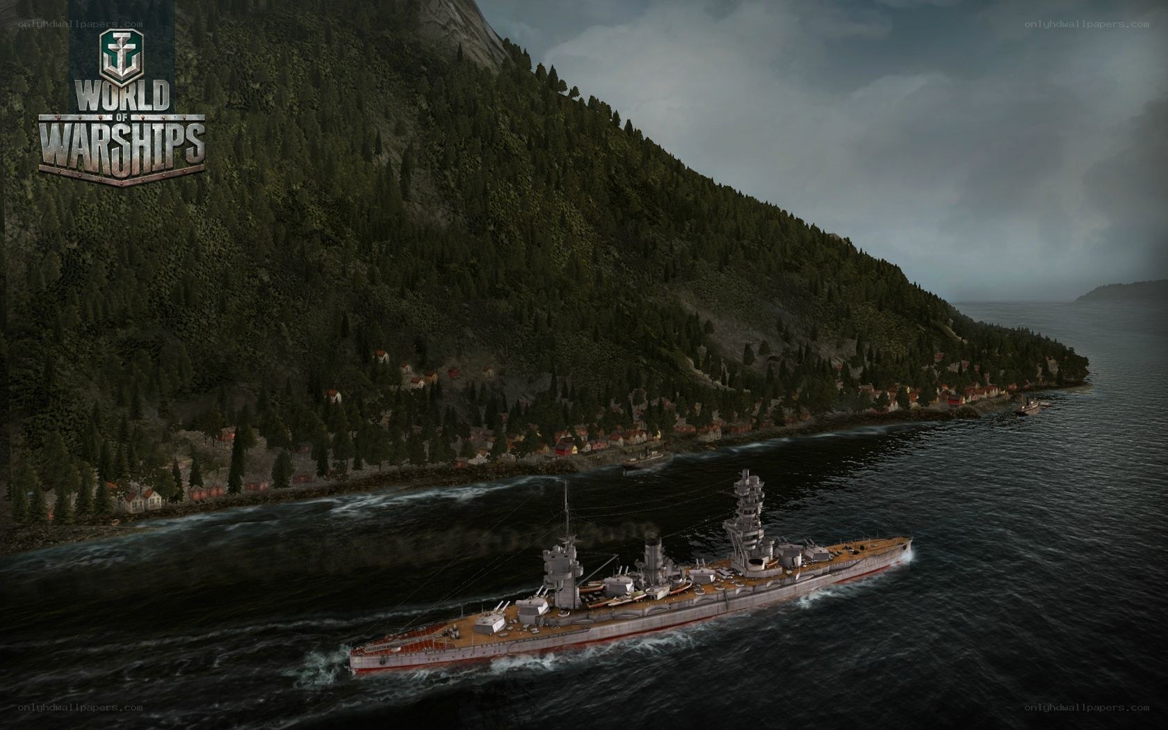 Warship near forested coast