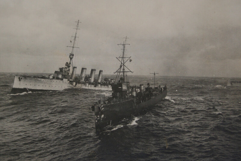 Warships at sea in rough waters