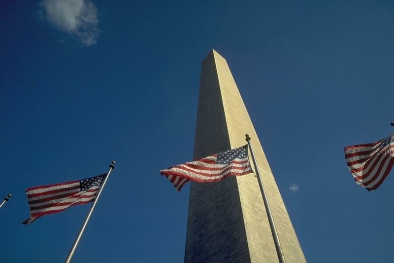 Washington Monument with flags