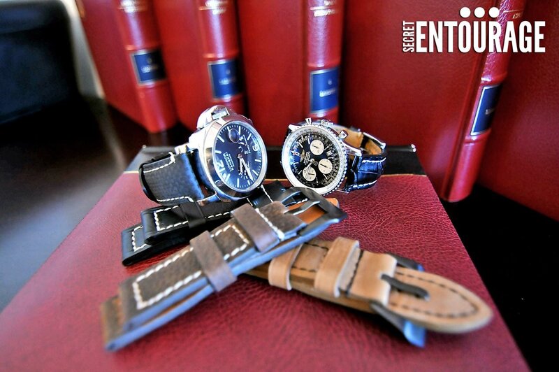 watches and straps on red leather