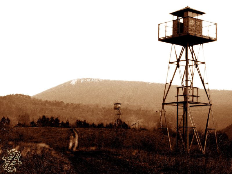 Watchtowers in a hilly landscape