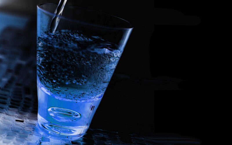 Water being poured into a glass