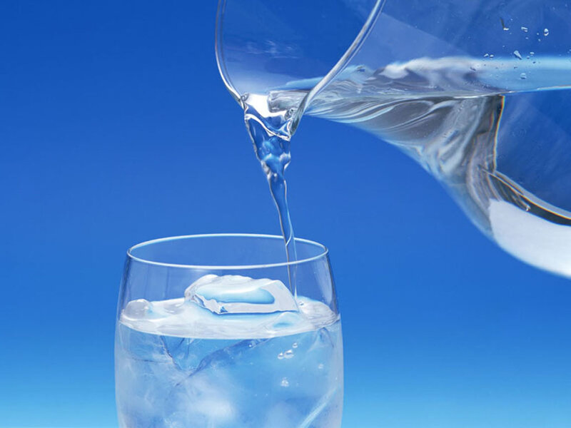 Water being poured into a glass