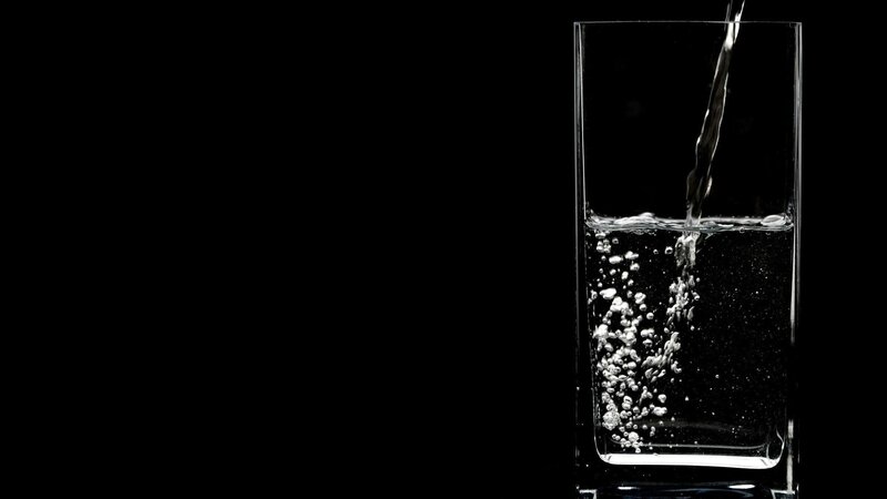 Water being poured into a glass