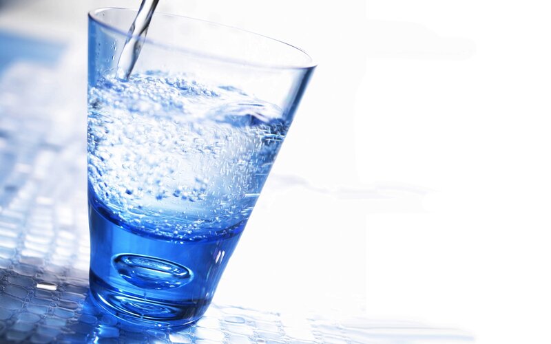 Water being poured into a glass