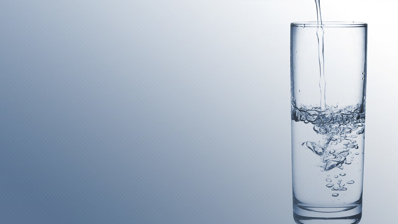 Water being poured into a glass