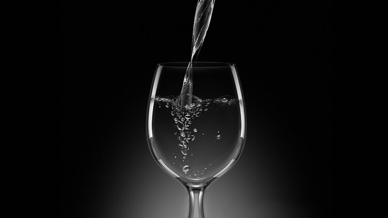 Water Being Poured into Glass — Black