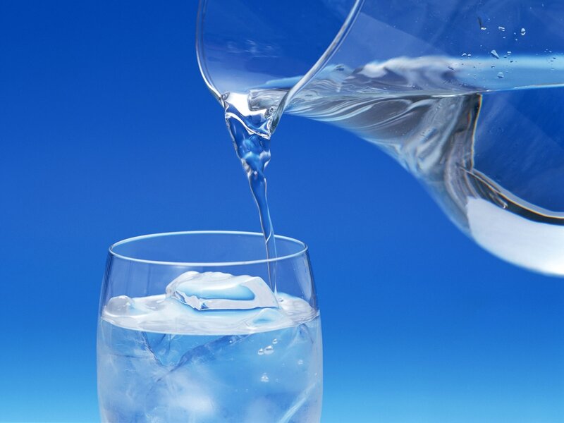 water being poured into glass