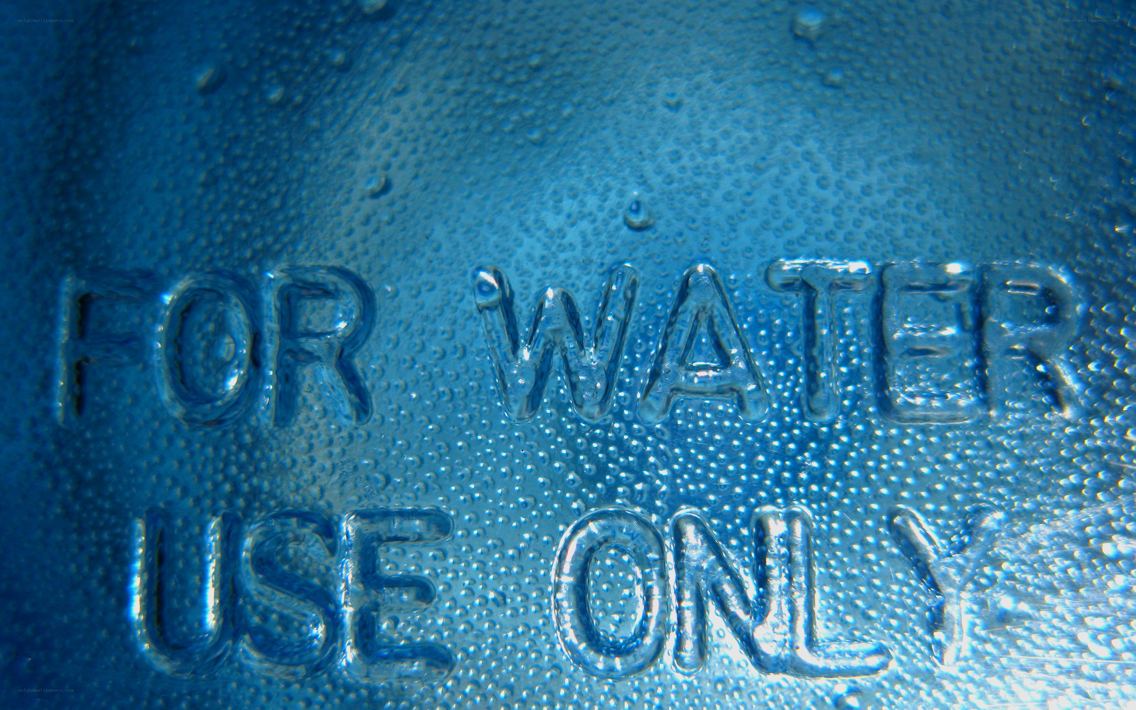 Water bottle with embossed text