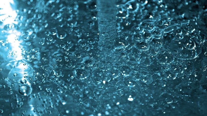 Water bubbling and flowing