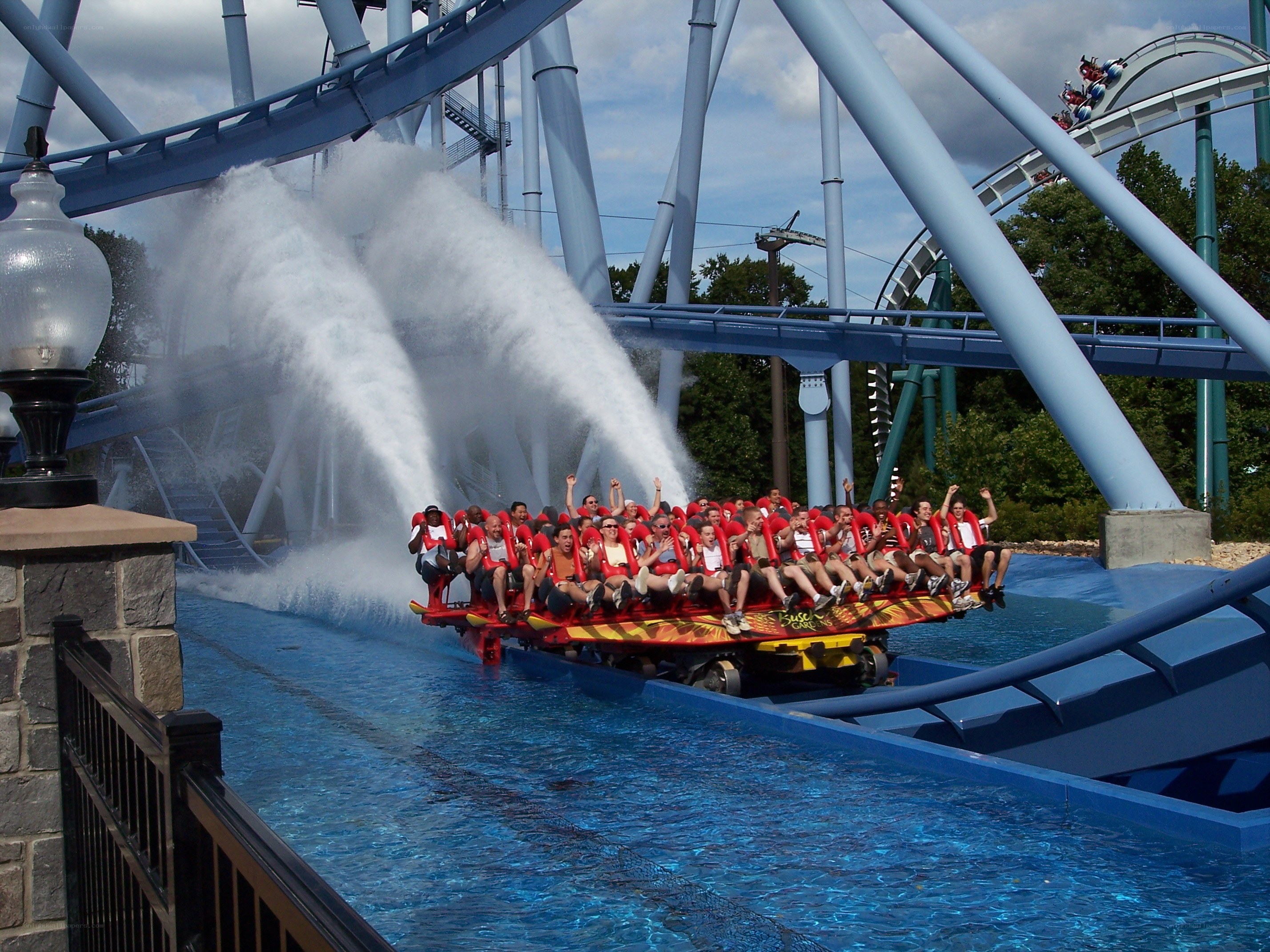Water coaster ride with riders