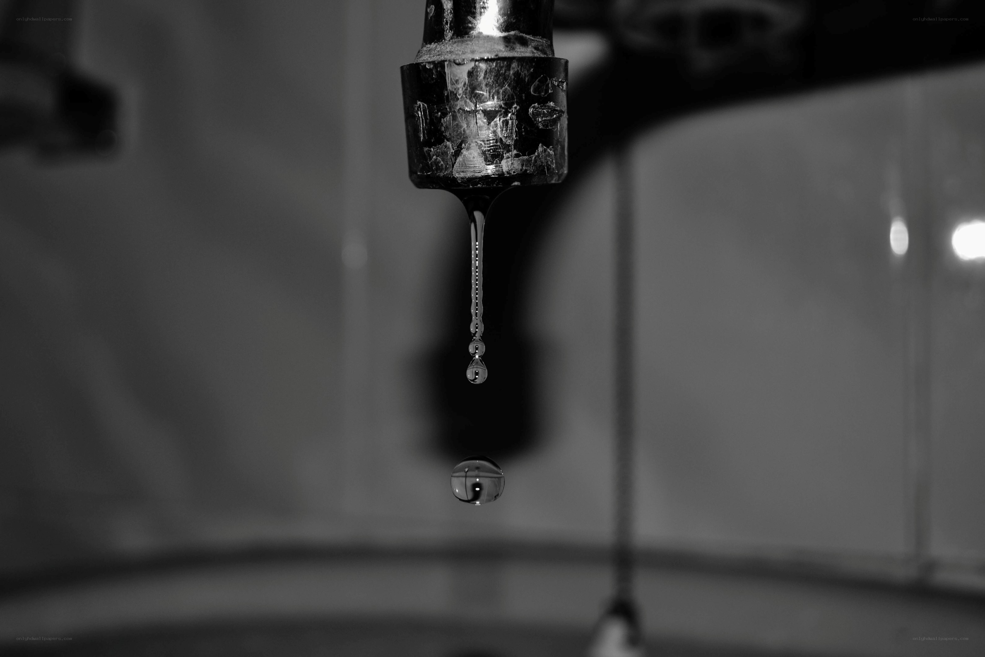 Water dripping from a faucet