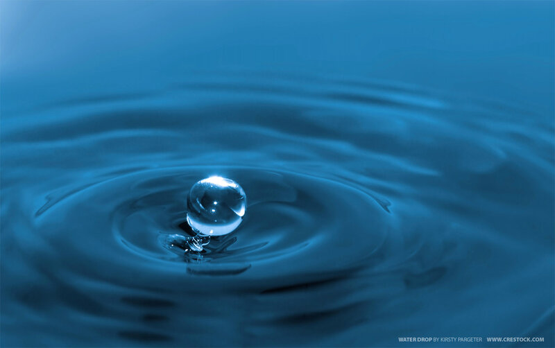 Water drop creating ripples