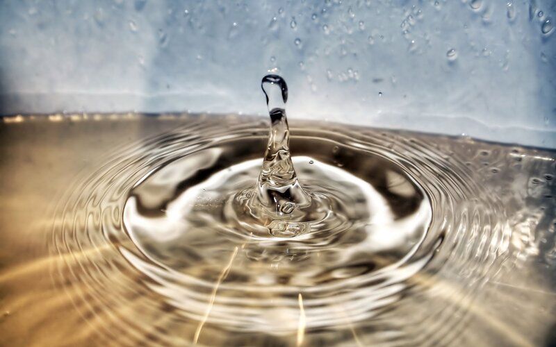 Water drop creating ripples