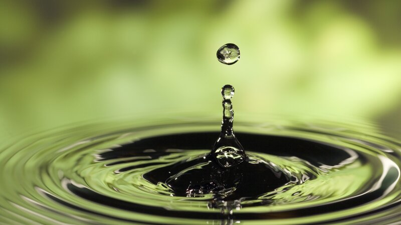 Water drop creating ripples