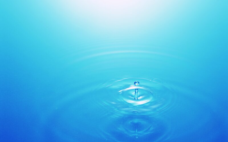 Water drop creating ripples