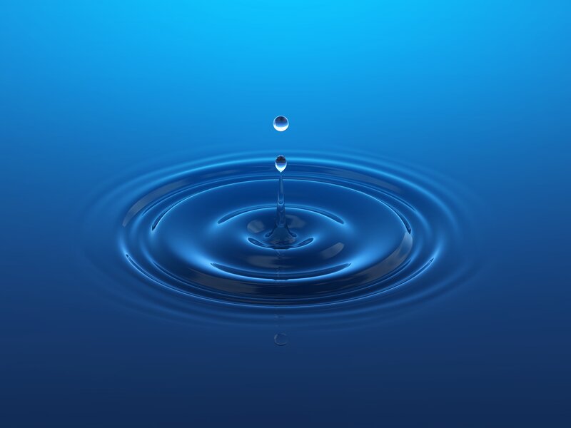 Water drop creating ripples