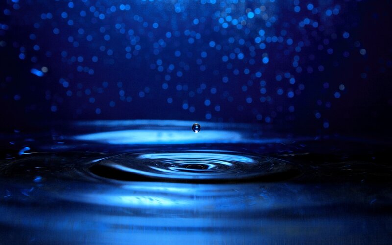 Water drop creating ripples