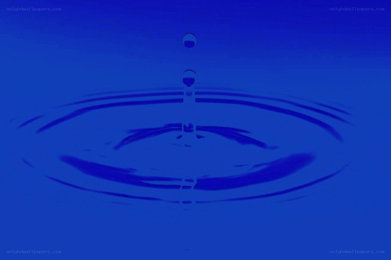 Water drop creating ripples