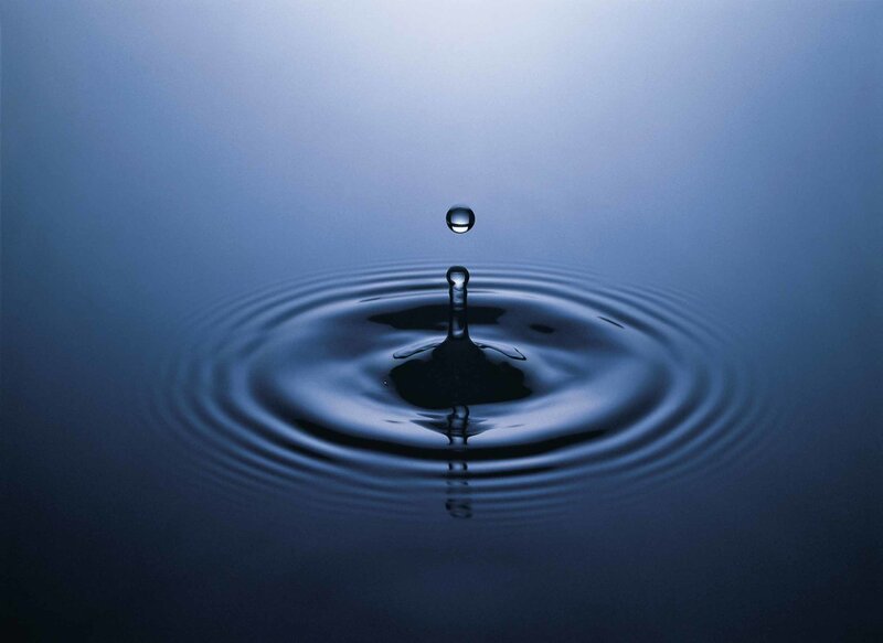 Water drop creating ripples