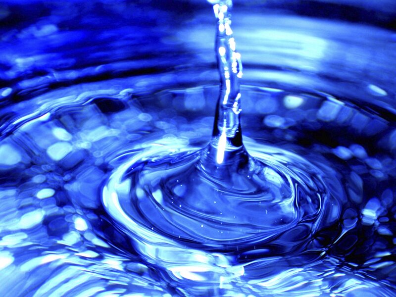 Water drop creating ripples
