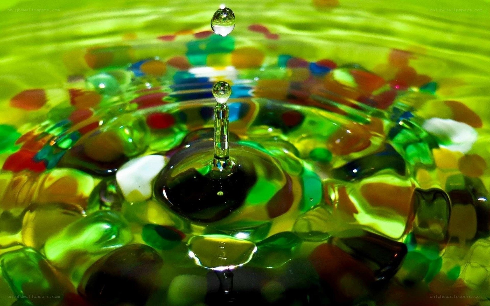 Water drop impact on colorful surface