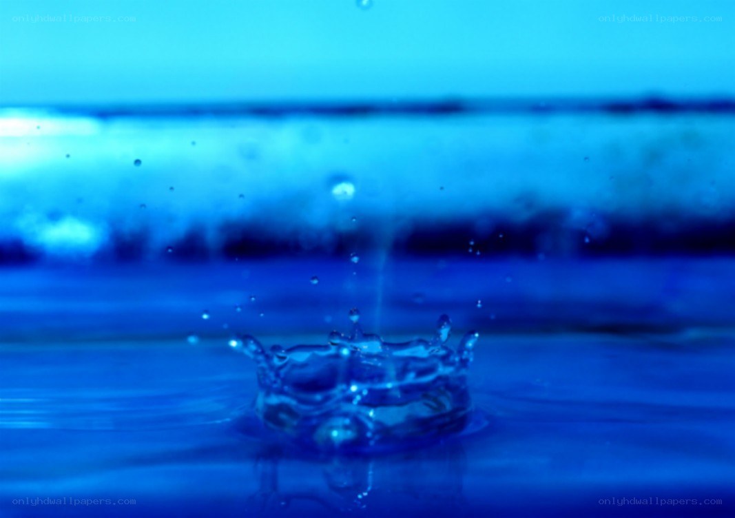 Water drop splash in blue