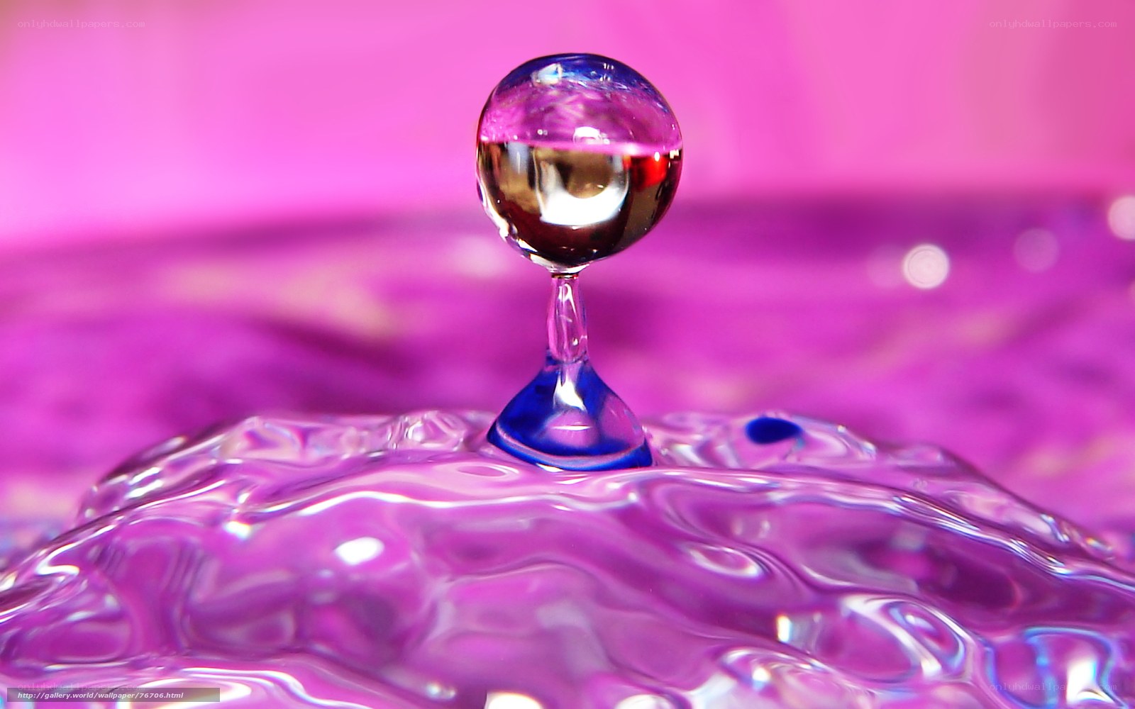 Water drop splash in purple