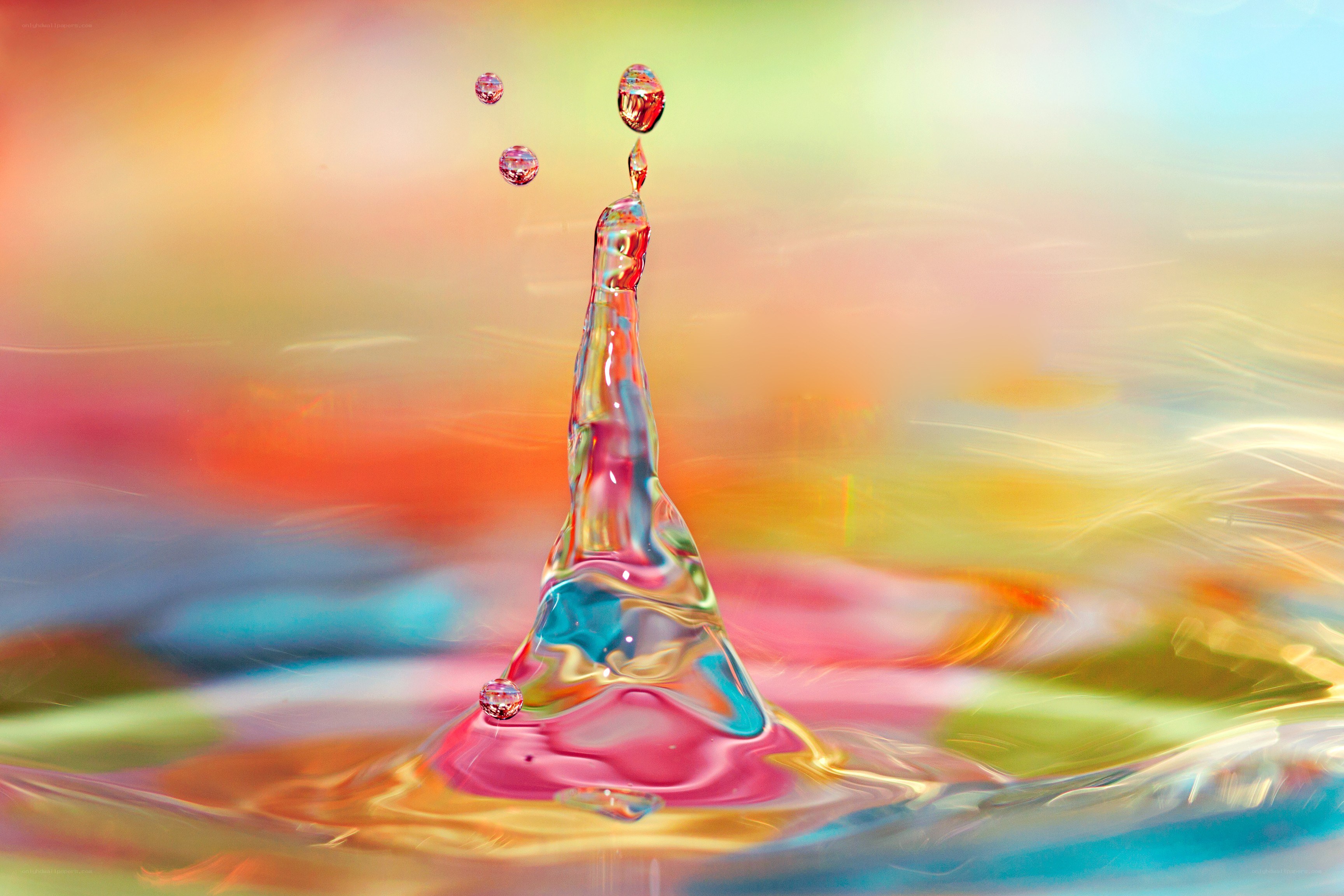 Water drop splash with colorful background
