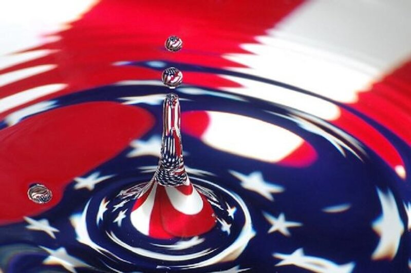 Water drop with flag reflection