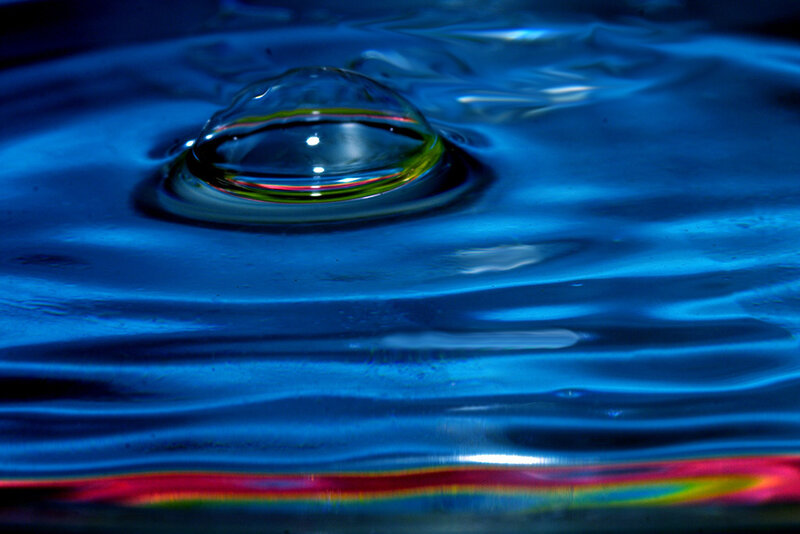 Water droplet creating ripples