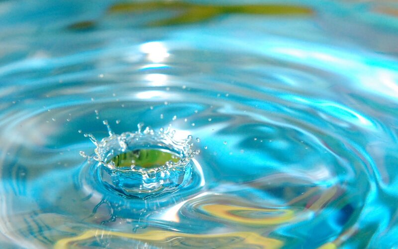 Water droplet creating ripples