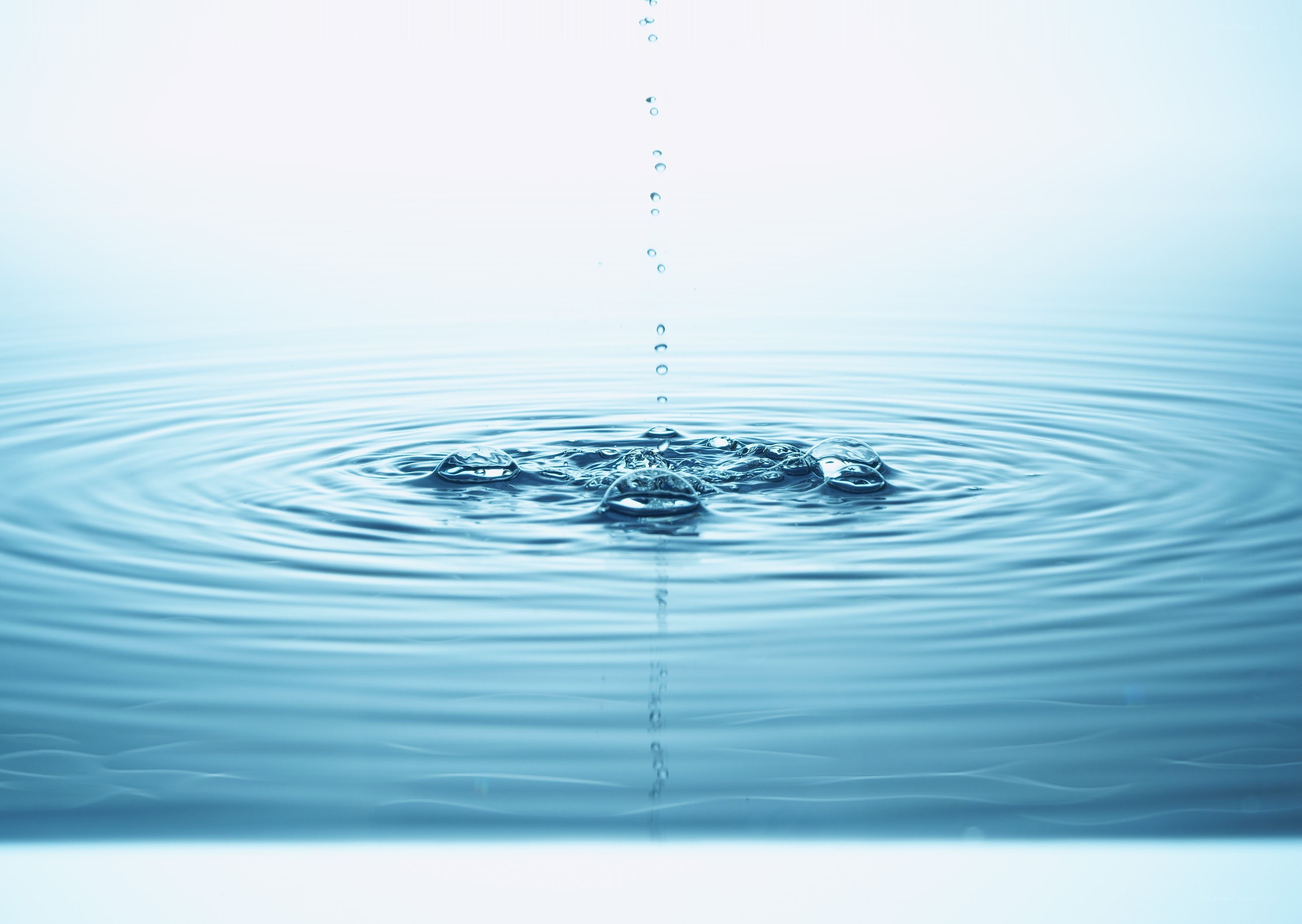 Water droplet creating ripples