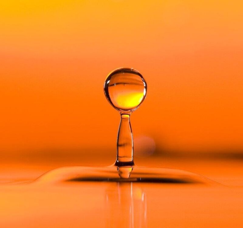 Water Droplet in Mid-air — Orange