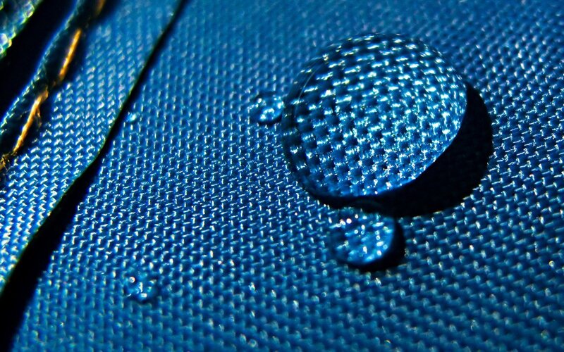 Water droplet on blue fabric