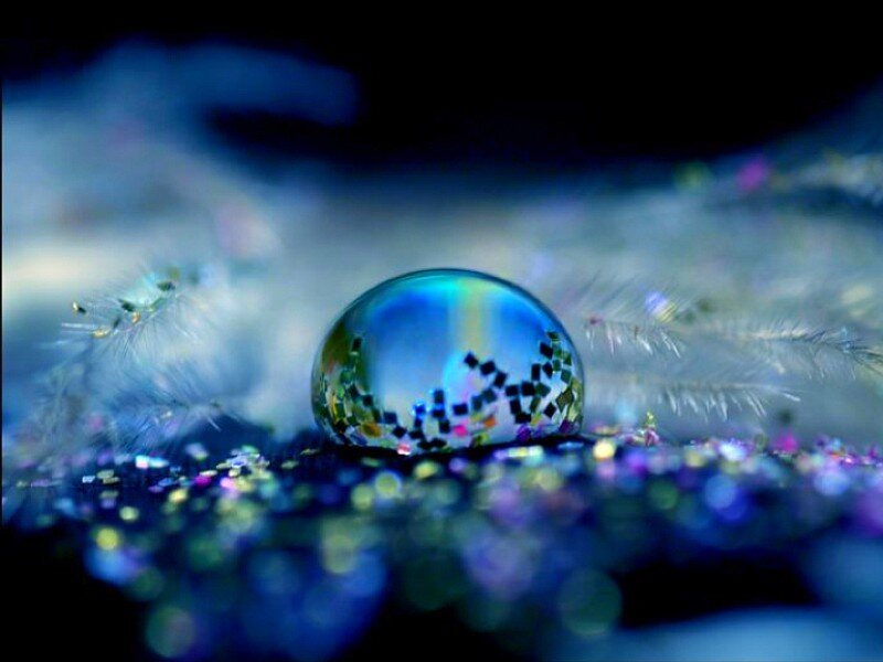 Water droplet on glittery surface