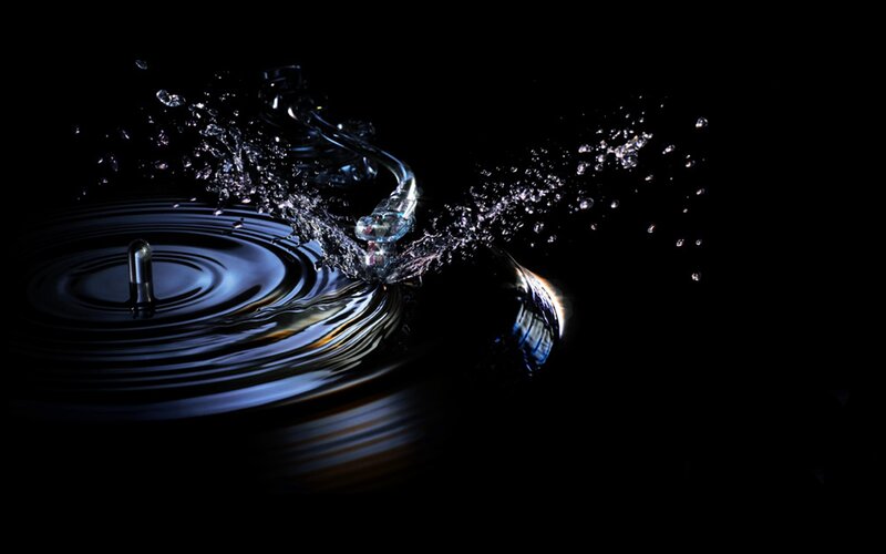 Water droplet splashing on surface