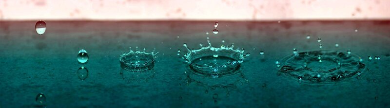 Water droplets creating ripples