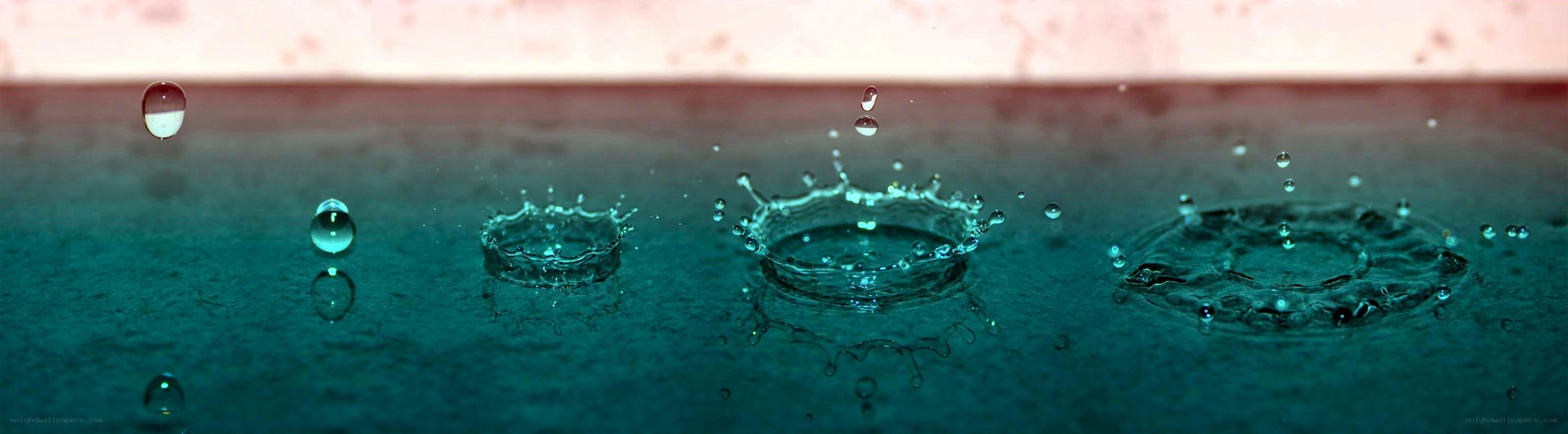 Water droplets creating ripples