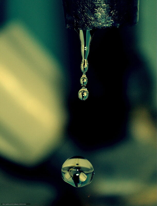 Water droplets falling from a faucet