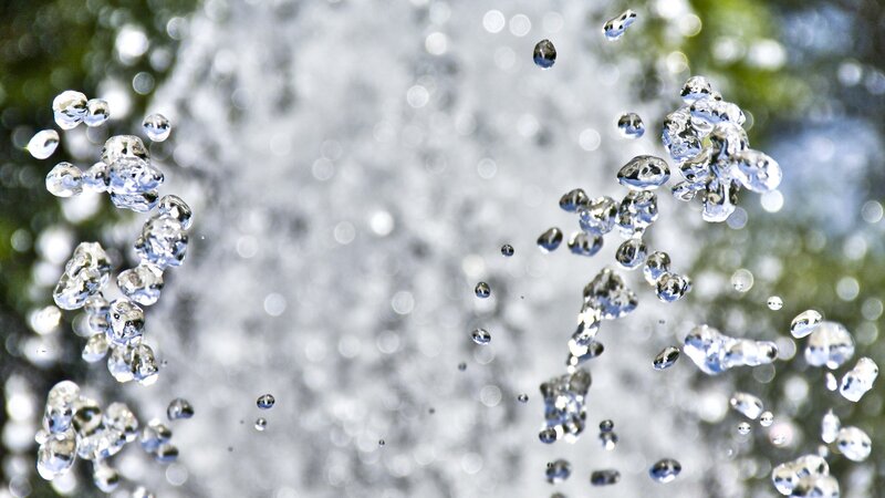 Water Droplets in Motion — White